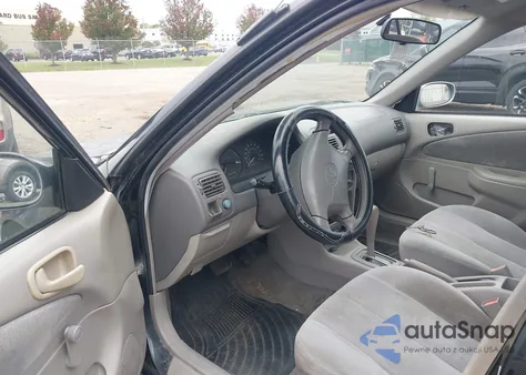 2002 Toyota Corolla Ce из США, поврежденный, VIN 2T1BR12E92C521983